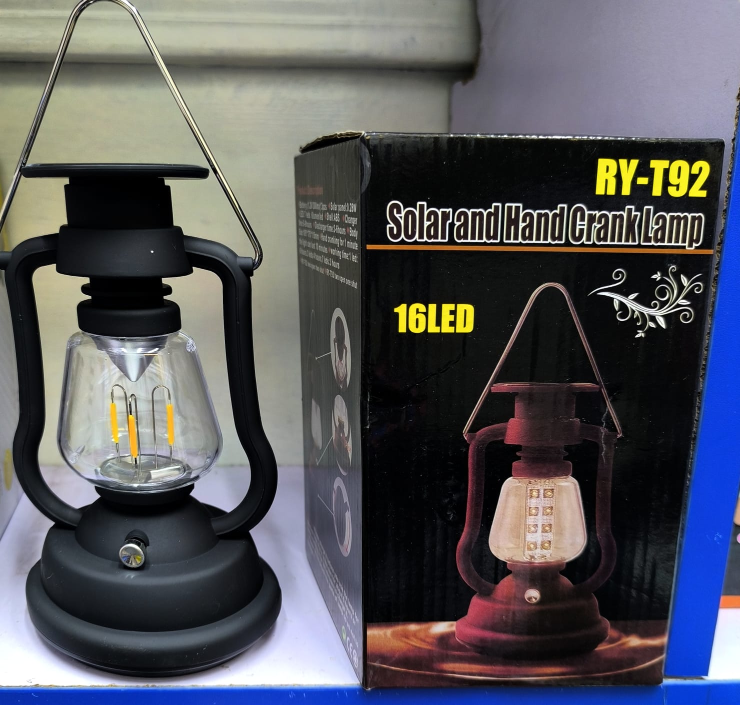 Solar and hand crank lamp