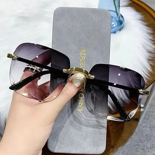 Thumbnail of Sunglasses New Square Rimlesss